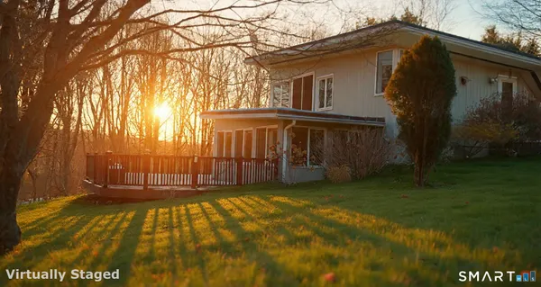 a view of a house with backyard