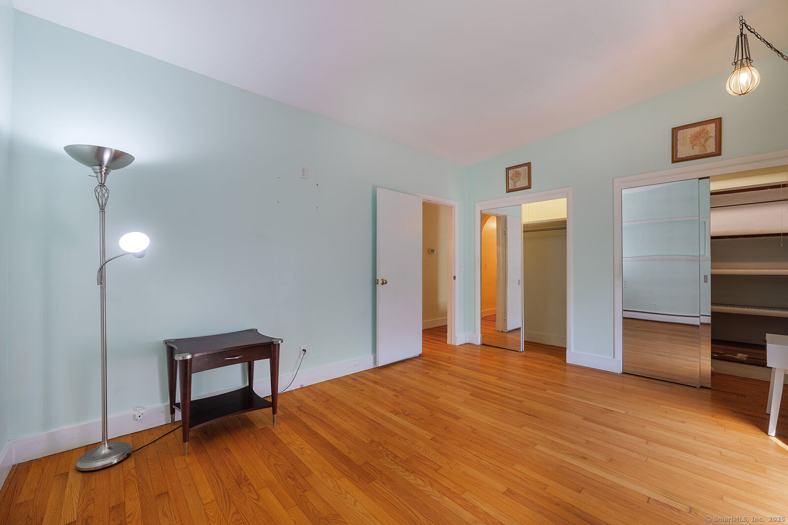26 Wilridge Road Ridgefield, CT 06877 - Photo 14 of 40 a bedroom with a bed and a table