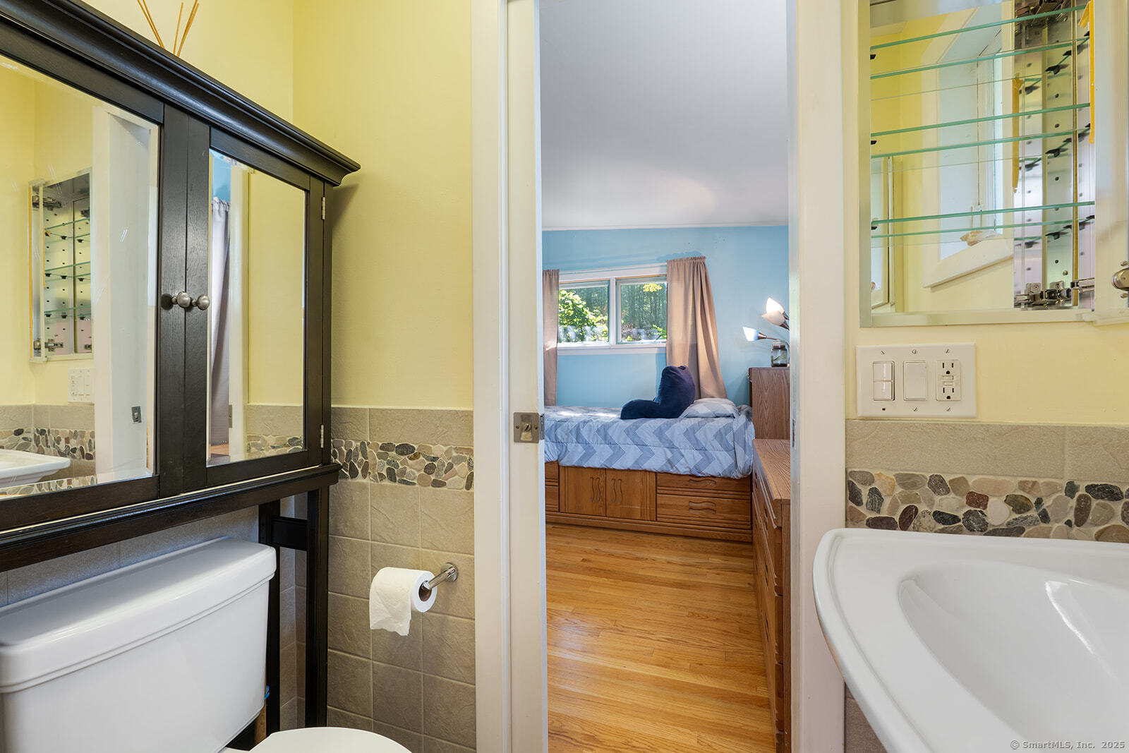 26 Wilridge Road Ridgefield, CT 06877 - Photo 15 of 40 a bathroom with a granite countertop sink and a bathtub