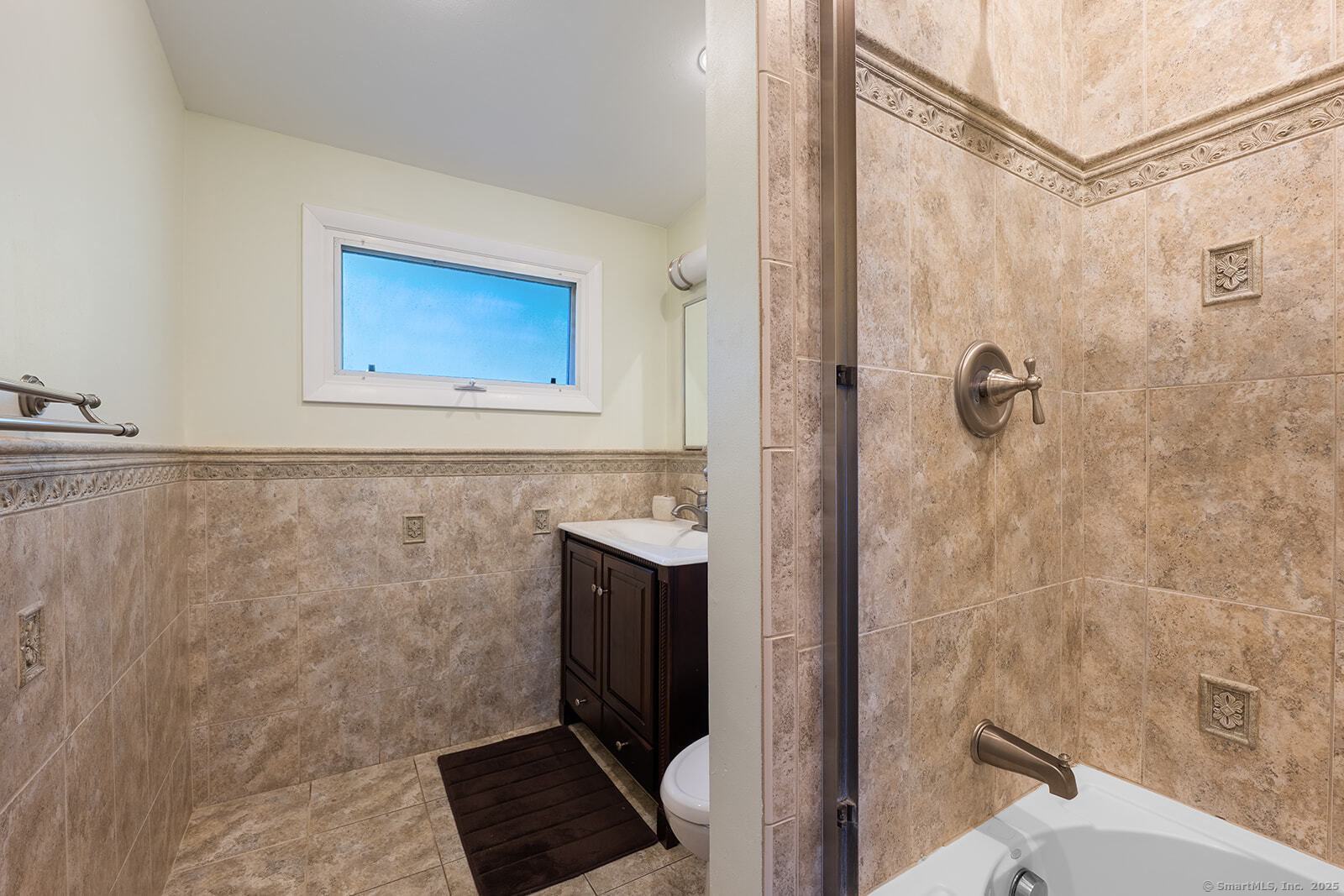26 Wilridge Road Ridgefield, CT 06877 - Photo 24 of 40 a bathroom with a shower and a sink