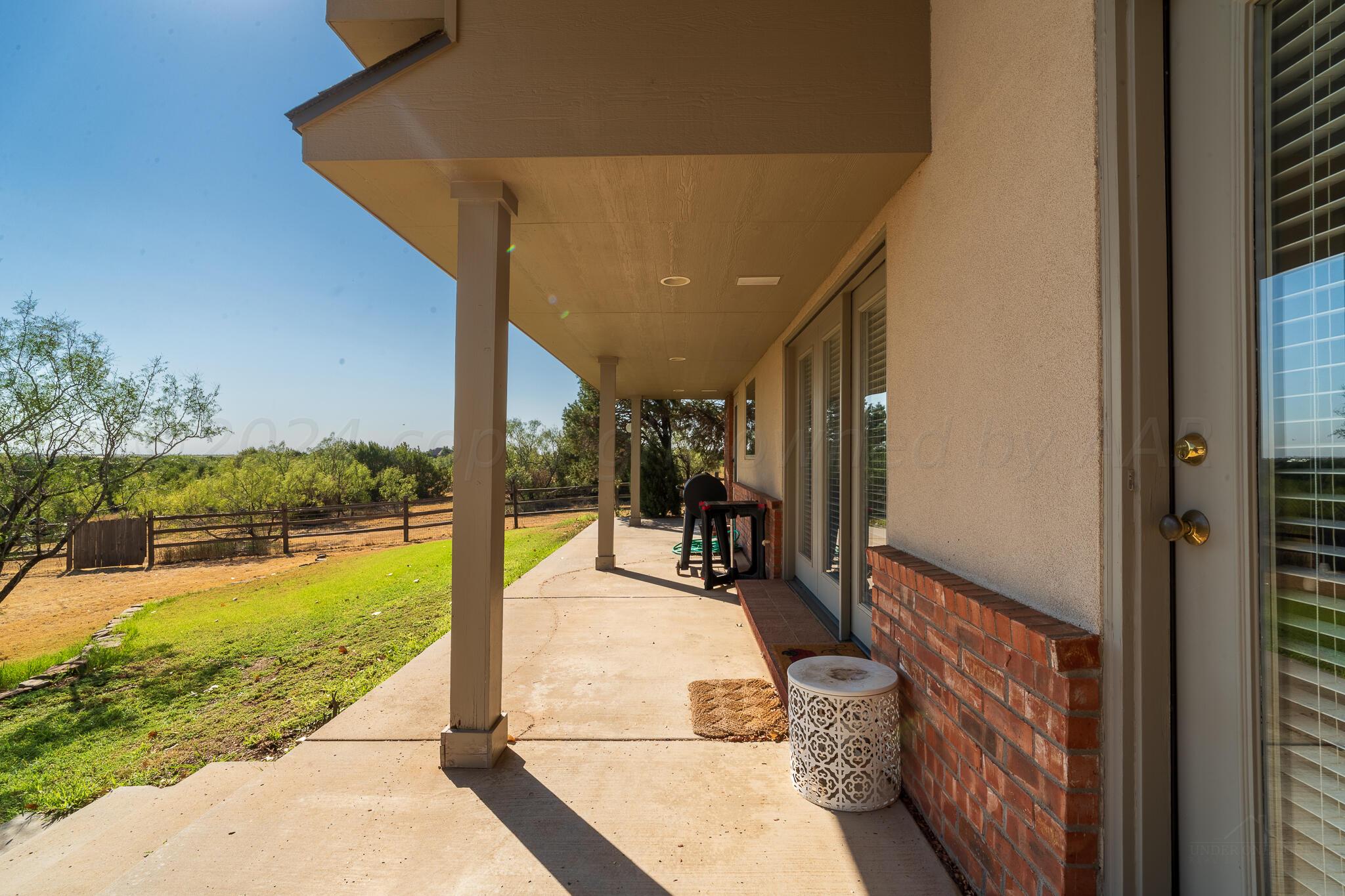 327 Lake Ridge Road Canyon, TX 79015 - Photo 26 of 38 a view of a swimming pool with an outdoor seating