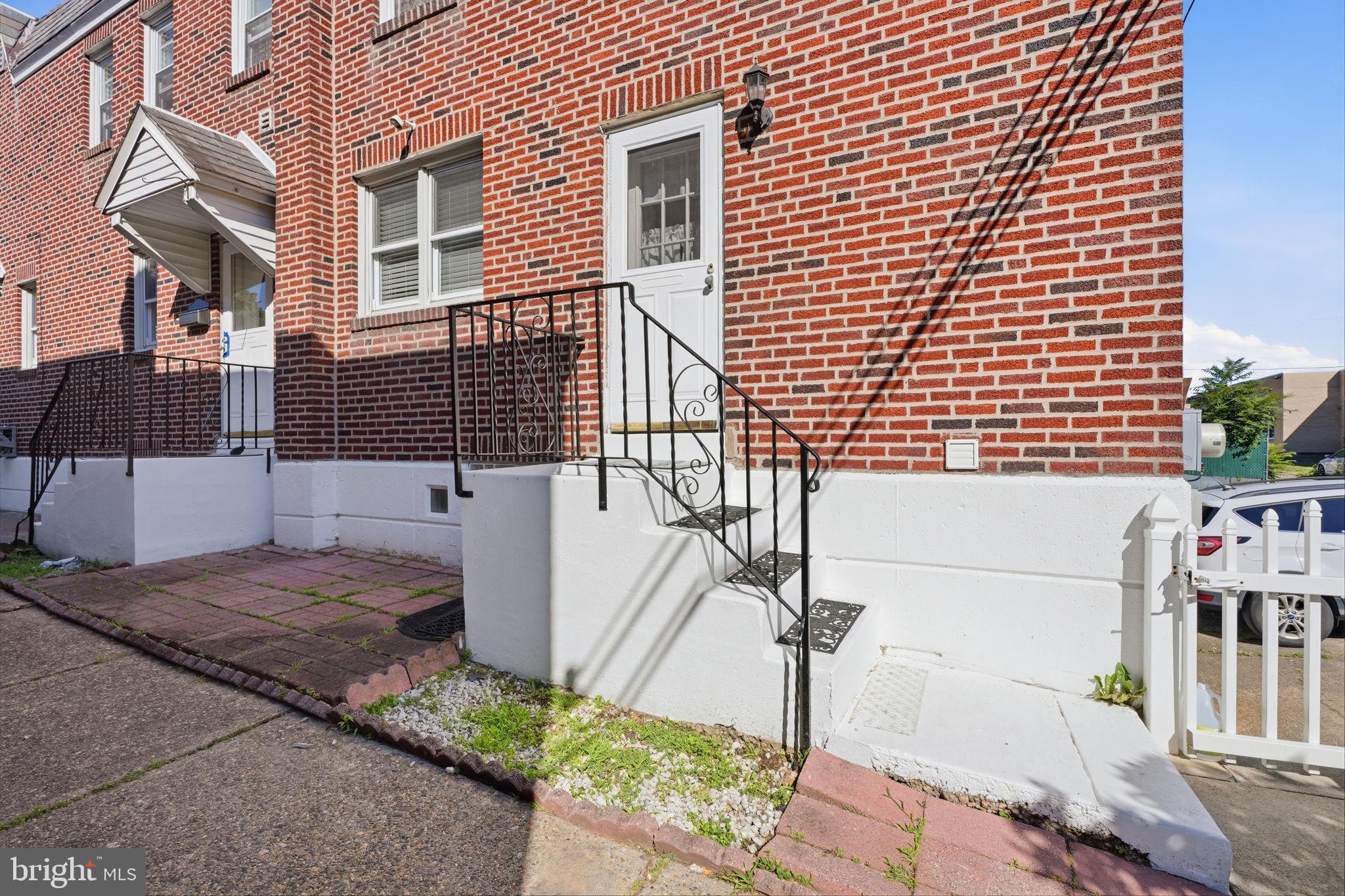 1025 Friendship Street Philadelphia, PA 19111 - Photo 31 of 36 Charming brick facade with inviting steps.