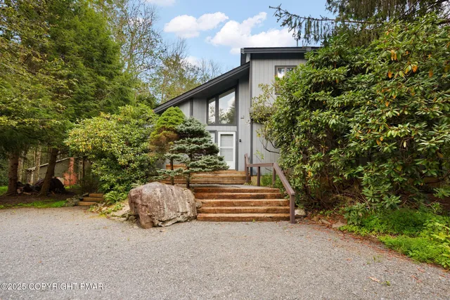 a house view with a garden space
