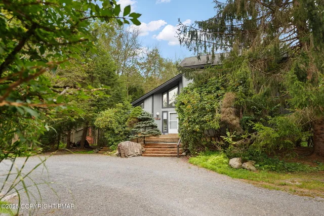a house view with a garden space