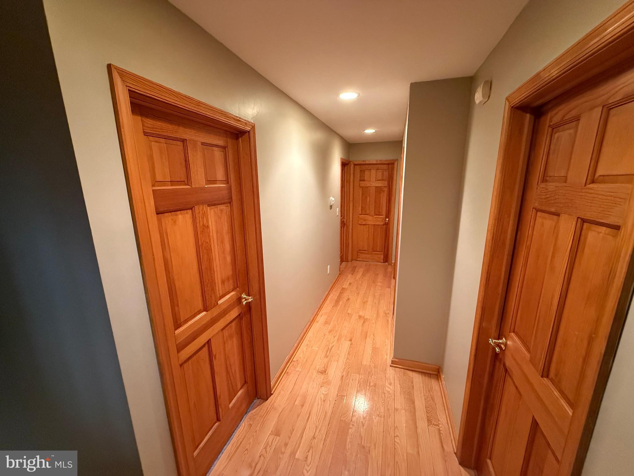 620 Columbia Road Egg Harbor City, NJ 08215 - Photo 27 of 53 a view of a hallway with wooden floor and staircase