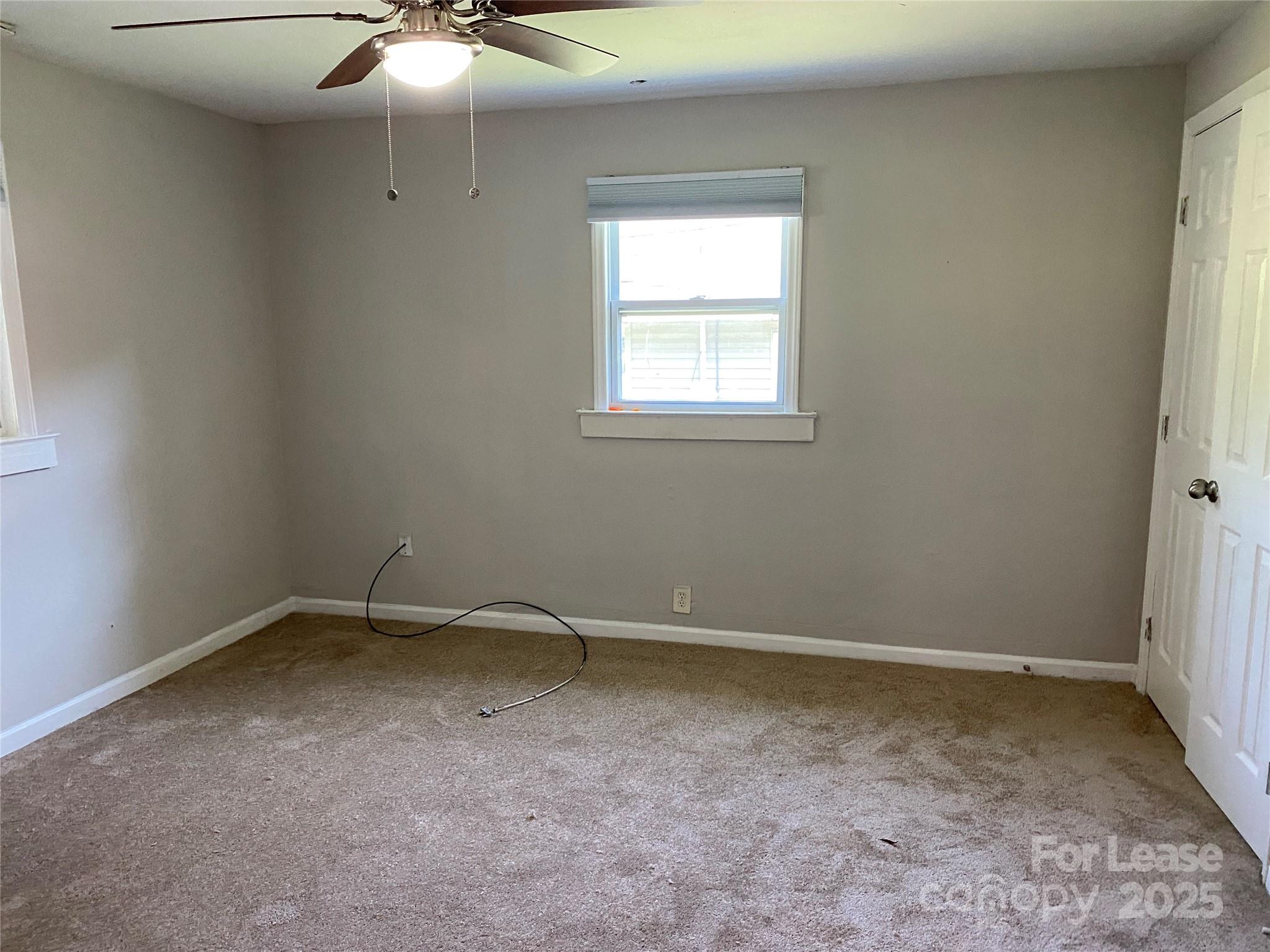 324 North Pryor Street Gastonia, NC 28052 - Photo 6 of 9 an empty room with a window