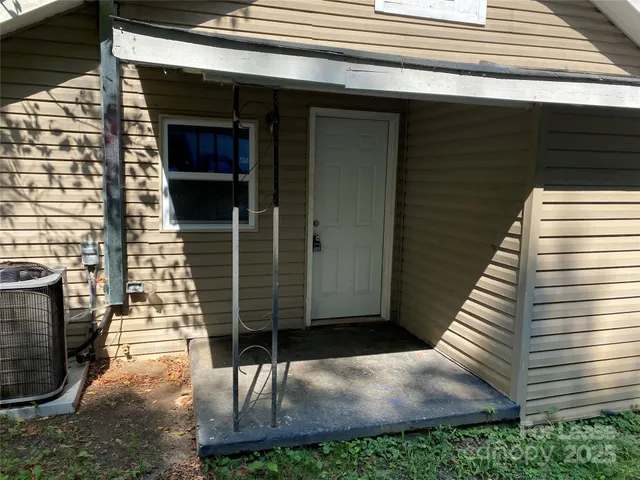 a view of backyard door of the house