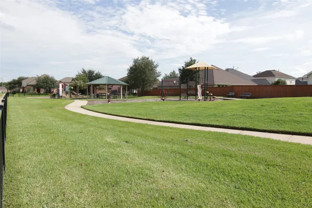 a view of a golf course with a garden