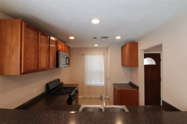 a room with furniture wall and a window