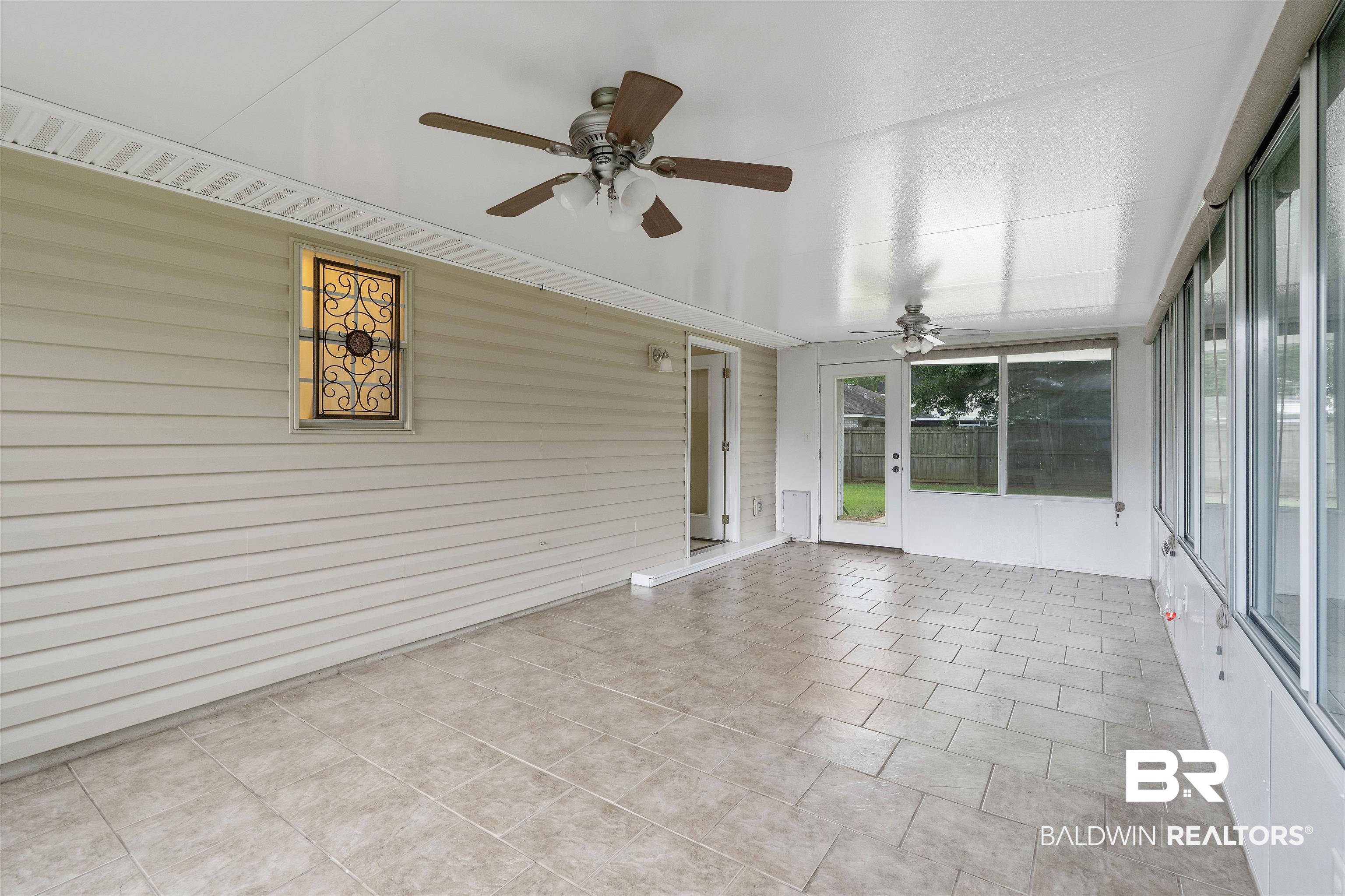 25779 Austin Road Daphne, AL 36526 - Photo 17 of 30 Unfurnished sunroom with ceiling fan