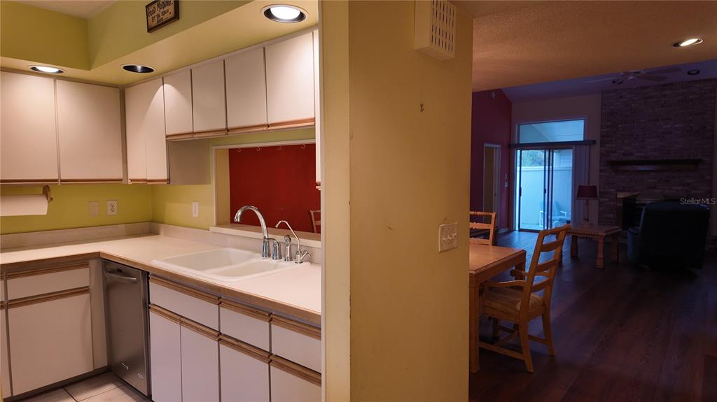 1767 Southeast 27th Loop Ocala, FL 34471 - Photo 14 of 79 a kitchen with a sink cabinets and appliances