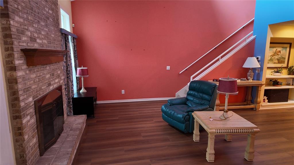 1767 Southeast 27th Loop Ocala, FL 34471 - Photo 27 of 79 a living room with furniture and a fireplace