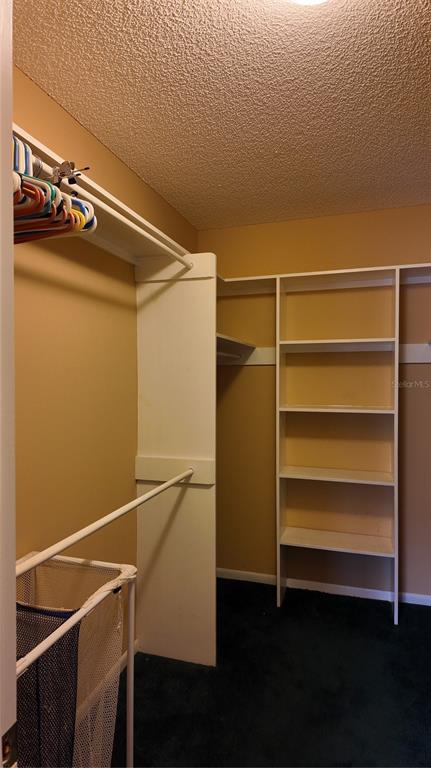 1767 Southeast 27th Loop Ocala, FL 34471 - Photo 34 of 79 a view of storage and utility room with empty racks