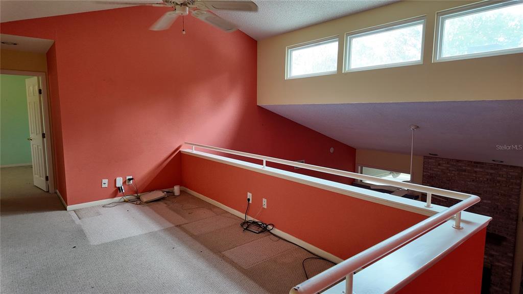 1767 Southeast 27th Loop Ocala, FL 34471 - Photo 49 of 79 a room with pool table and windows