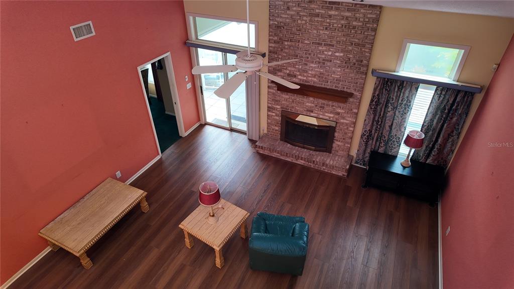 1767 Southeast 27th Loop Ocala, FL 34471 - Photo 50 of 79 a living room with furniture and a fireplace