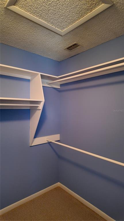 1767 Southeast 27th Loop Ocala, FL 34471 - Photo 53 of 79 a view of small space with racks on the wall