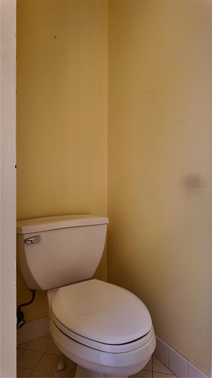1767 Southeast 27th Loop Ocala, FL 34471 - Photo 58 of 79 a white toilet sitting next to a white wall