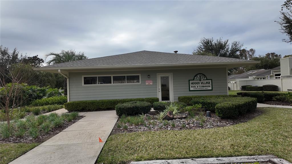 1767 Southeast 27th Loop Ocala, FL 34471 - Photo 72 of 79 a front view of a house with garden