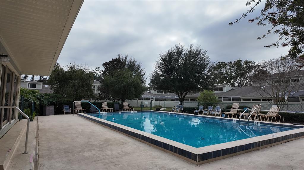 1767 Southeast 27th Loop Ocala, FL 34471 - Photo 77 of 79 a view of a swimming pool with a patio