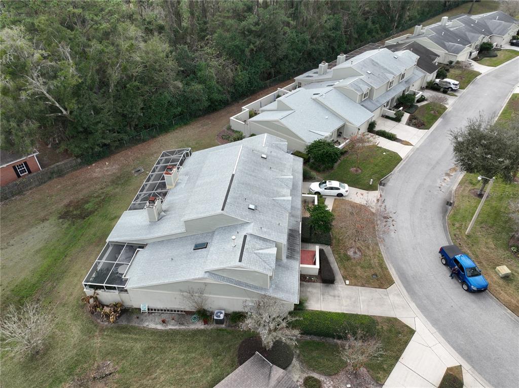 1767 Southeast 27th Loop Ocala, FL 34471 - Photo 8 of 79 an aerial view of a house with a yard