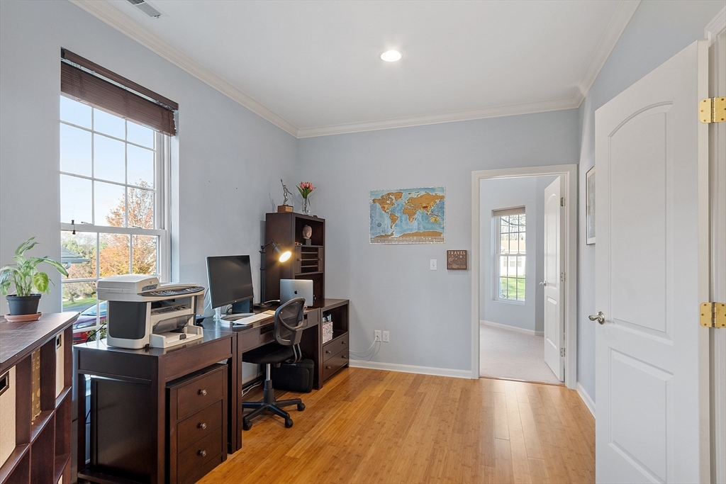 33 Summerfield Drive, Unit 33 Uxbridge, MA 01569 - Photo 5 of 21 a view of a workspace with furniture and a window