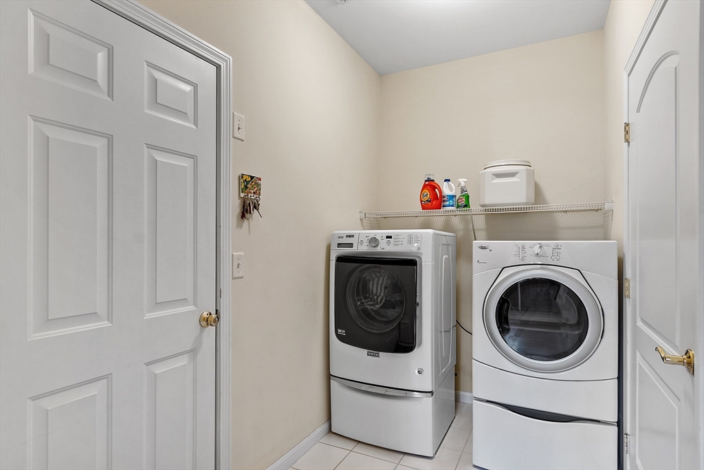33 Summerfield Drive, Unit 33 Uxbridge, MA 01569 - Photo 9 of 21 a utility room with dryer and washer