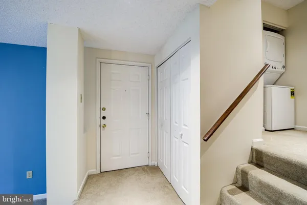 a view of an entryway with staircase