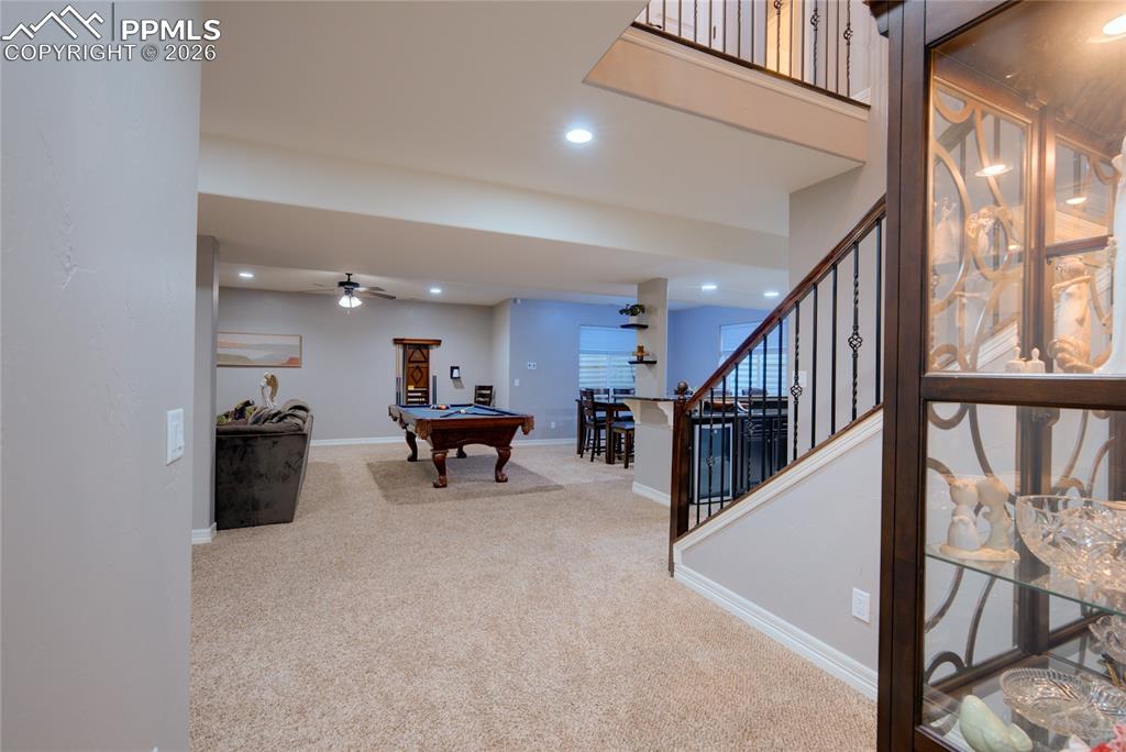 1112 Spectrum Loop Colorado Springs, CO 80921 - Photo 22 of 50 Recreation room featuring pool table, light carpet, recessed lighting, and a ceiling fan
