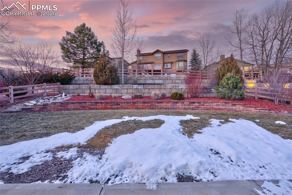 1112 Spectrum Loop Colorado Springs, CO 80921 - Photo 40 of 50 View of yard at dusk