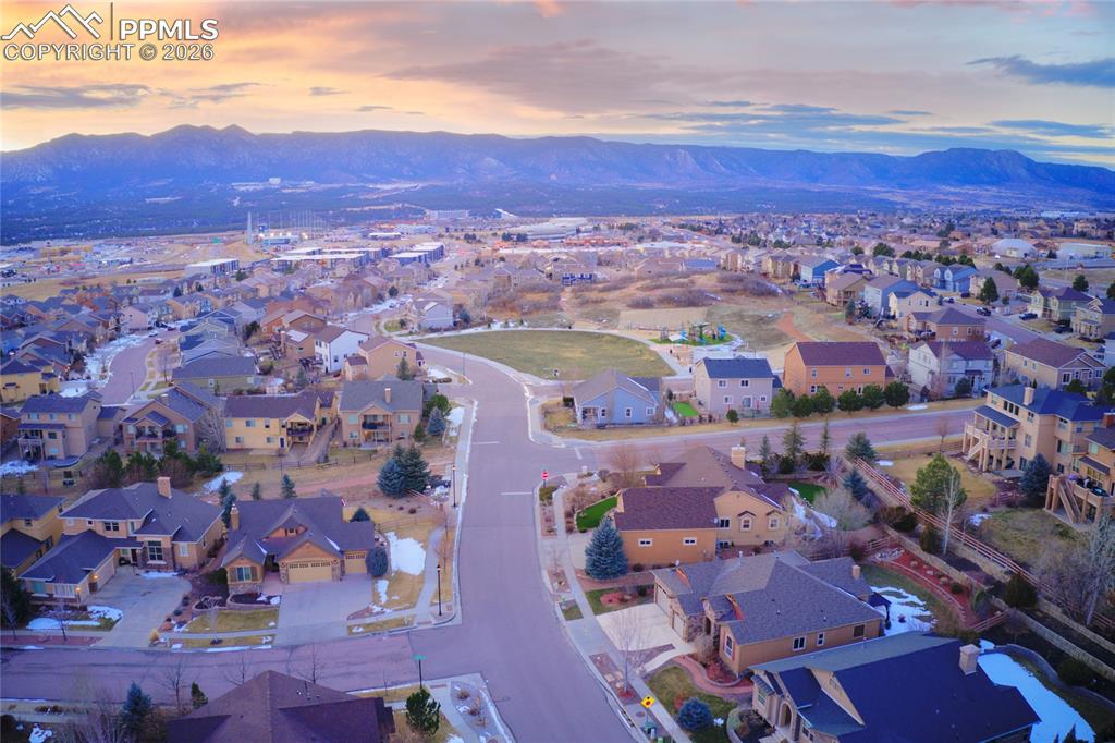 1112 Spectrum Loop Colorado Springs, CO 80921 - Photo 42 of 50 Aerial view of residential area featuring mountains