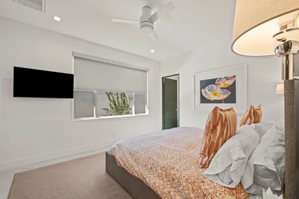 a bathroom with a double vanity sink and mirror