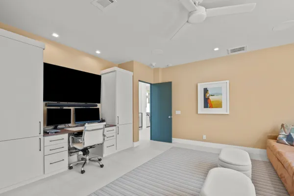 a close view of a sink and dishwasher with wooden floor