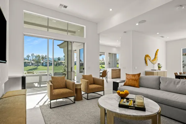 a path view of a house with a yard