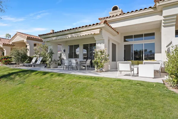 a view of a big yard with an trees