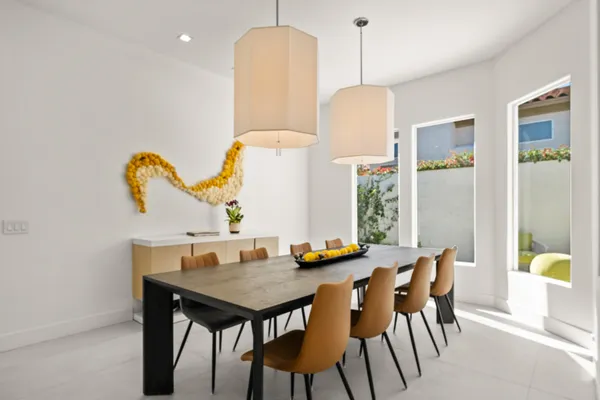 a kitchen with cabinets appliances and a sink