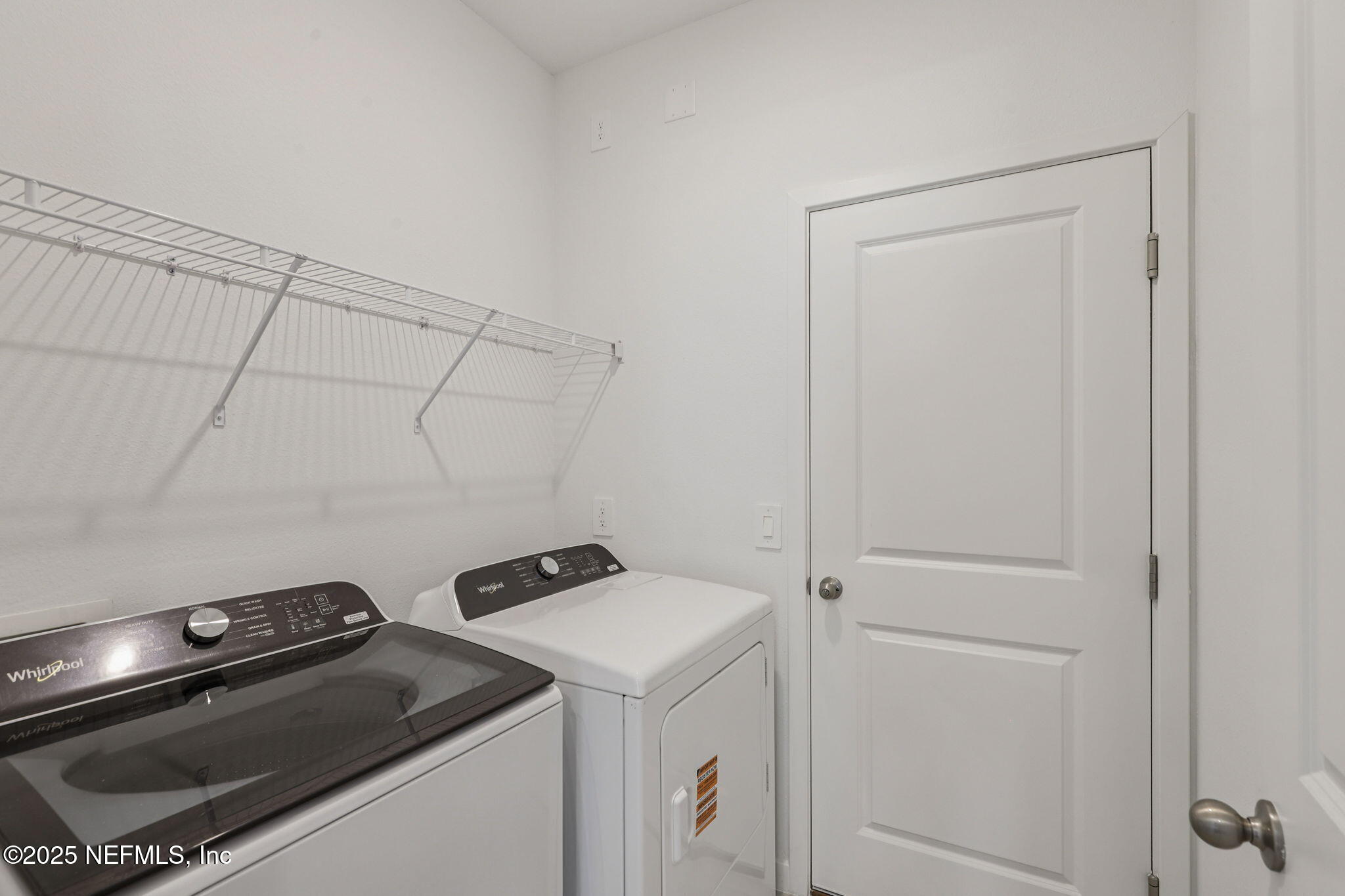 7351 Queensgate Circle Jacksonville, FL 32219 - Photo 18 of 38 a utility room with dryer and washer