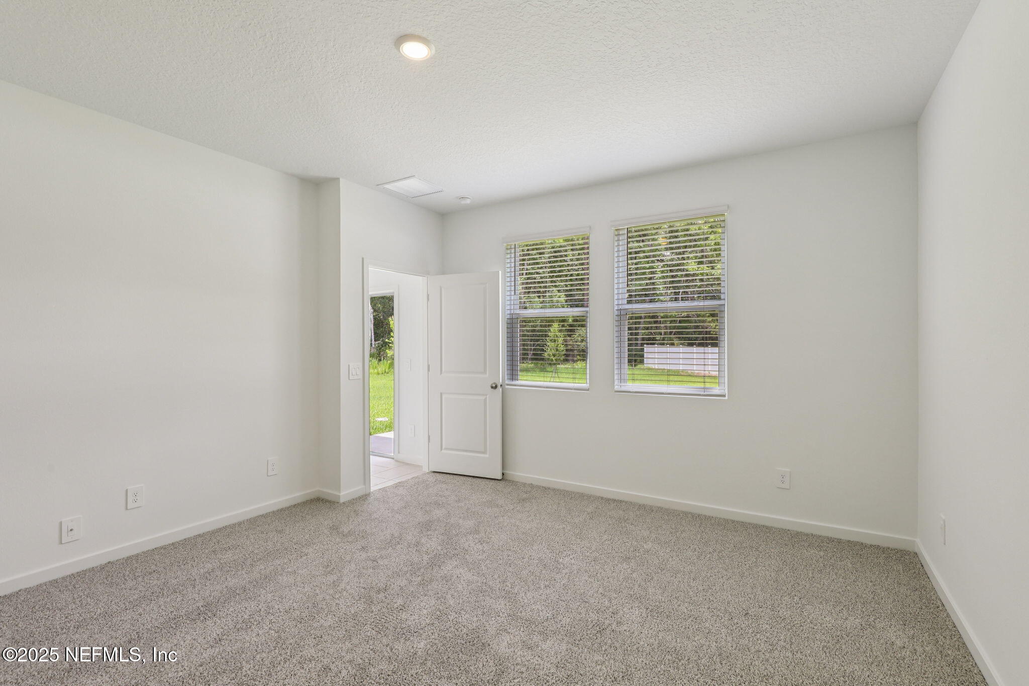 7351 Queensgate Circle Jacksonville, FL 32219 - Photo 20 of 38 an empty room with windows
