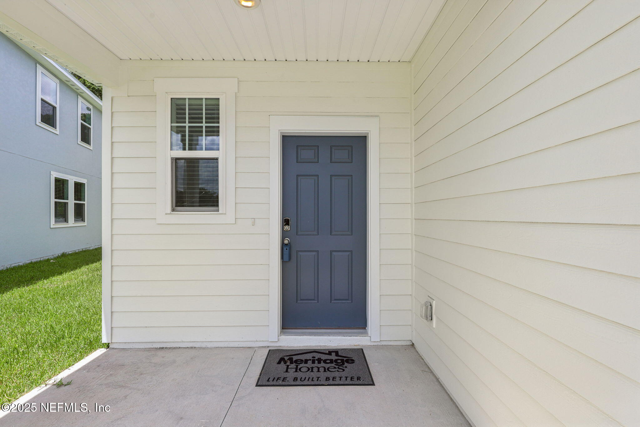 7351 Queensgate Circle Jacksonville, FL 32219 - Photo 3 of 38 a view of a entryway door of the house