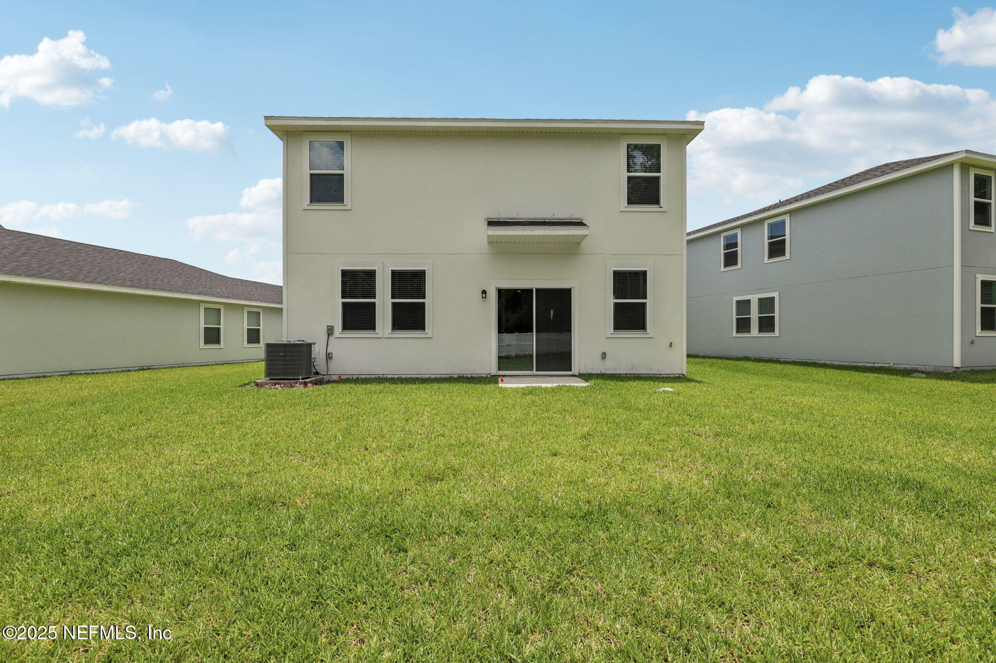 7351 Queensgate Circle Jacksonville, FL 32219 - Photo 33 of 38 a view of a house with backyard