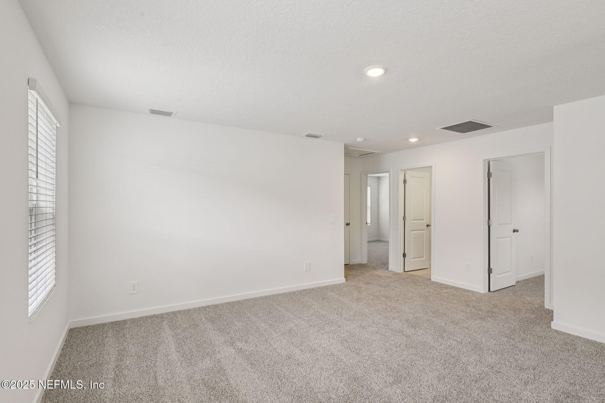 7351 Queensgate Circle Jacksonville, FL 32219 - Photo 4 of 38 a view of an empty room