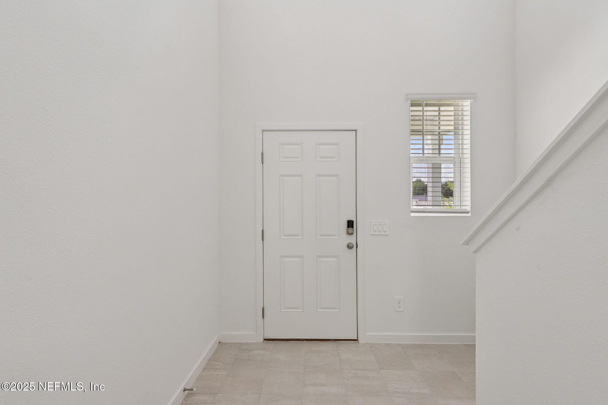 7351 Queensgate Circle Jacksonville, FL 32219 - Photo 5 of 38 an empty room with windows