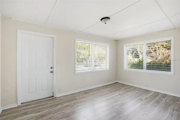 a view of an empty room with a window