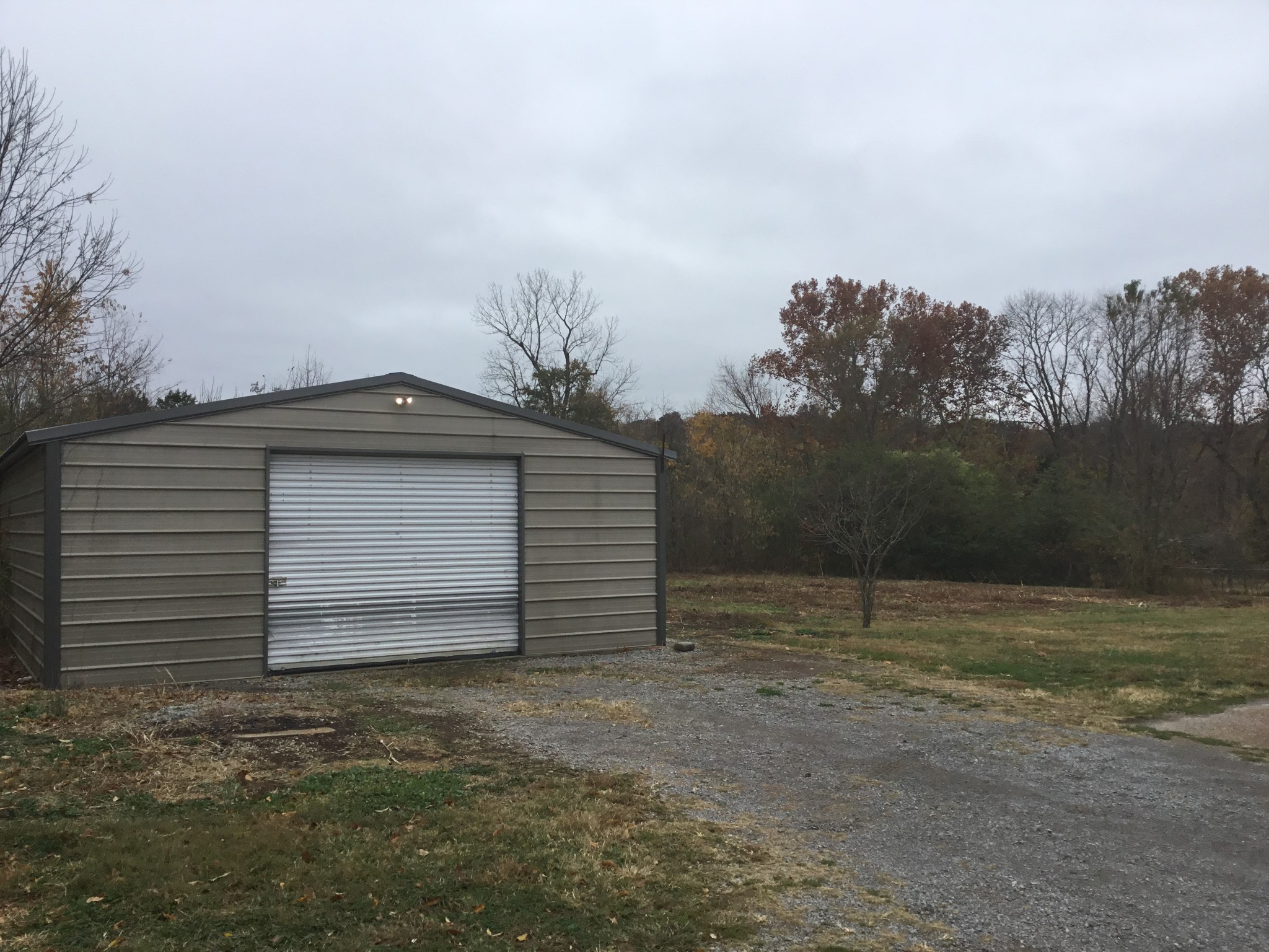 2780 Holloway Road Lebanon, TN 37090 - Photo 2 of 5 a house with trees in the background