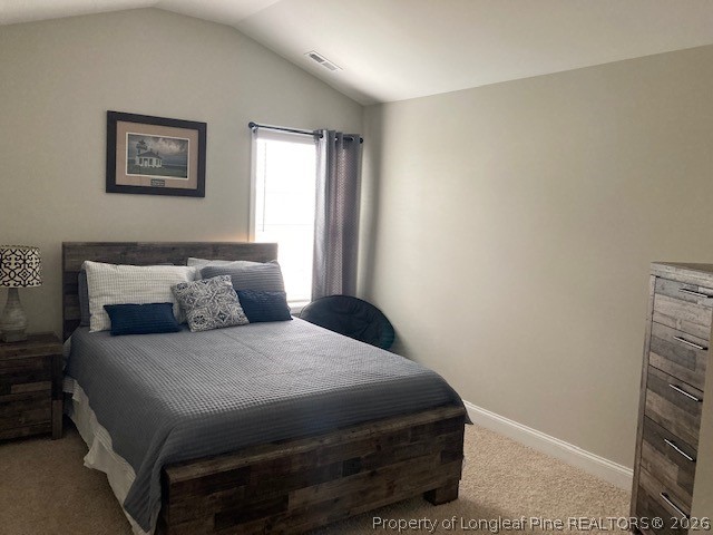 144 Haynes Church Road Raeford, NC 28376 - Photo 18 of 24 a bedroom with a bed and a window