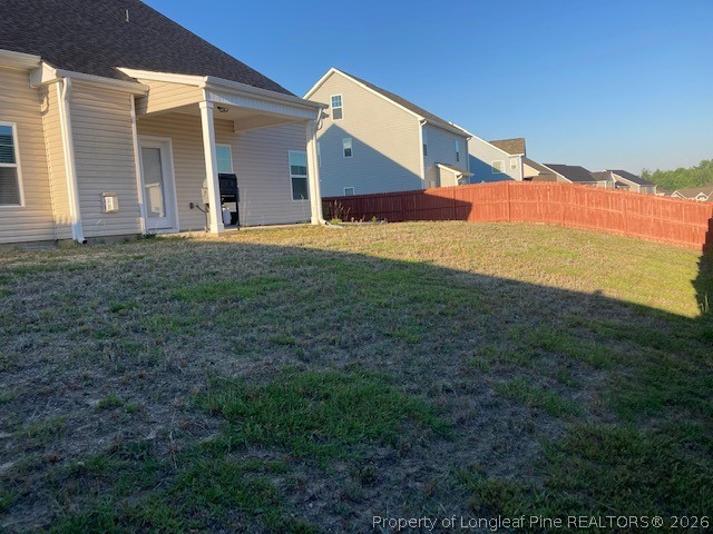 144 Haynes Church Road Raeford, NC 28376 - Photo 22 of 24 a backyard of a house with lots of green space