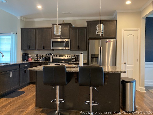 144 Haynes Church Road Raeford, NC 28376 - Photo 5 of 24 a kitchen with stainless steel appliances granite countertop a refrigerator a stove a sink dishwasher and a microwave oven with wooden floor
