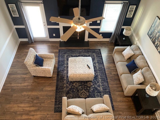 144 Haynes Church Road Raeford, NC 28376 - Photo 7 of 24 a living room with furniture and a fireplace