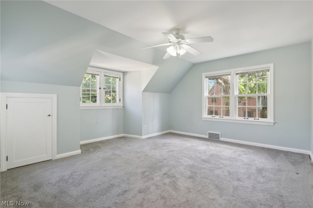 2620 Charney Road Cleveland, OH 44118 - Photo 19 of 43 Additional living space featuring carpet flooring, lofted ceiling, and ceiling fan