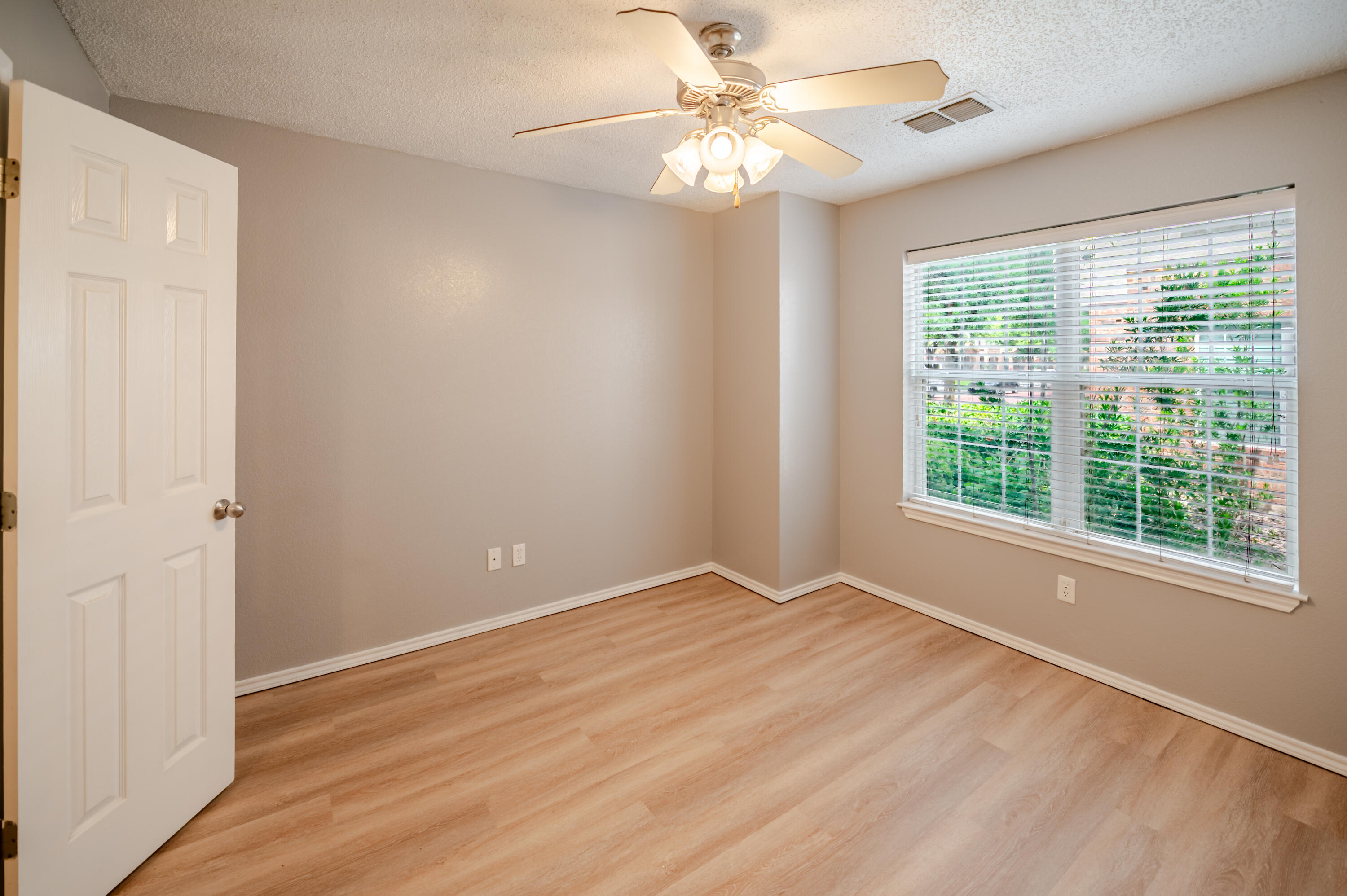 2111 Main Street, Unit 1 Lubbock, TX 79401 - Photo 14 of 36 a view of an empty room with a window