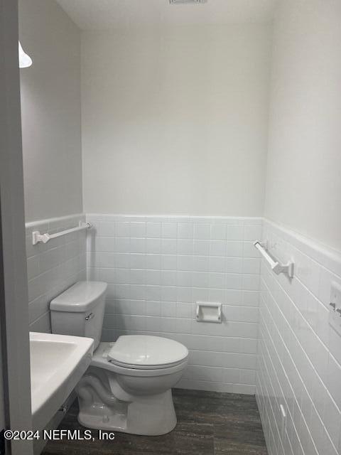 10322 State Rte 100 Starke, FL 32091 - Photo 15 of 15 a white toilet sitting next to a bathroom sink